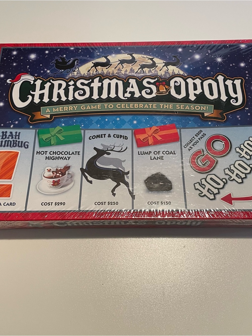 ChristmasOpoly Board Game - Festive Blue & Red Edition, USA made